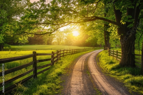 A beautiful country road in spring  with trees and green grass on both sides of the path  leading to an old wooden fence Generative AI