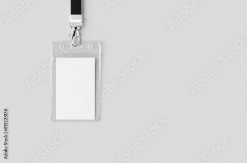 ID Card holder mockup with lanyard, vertical, copyspace. © Shablon