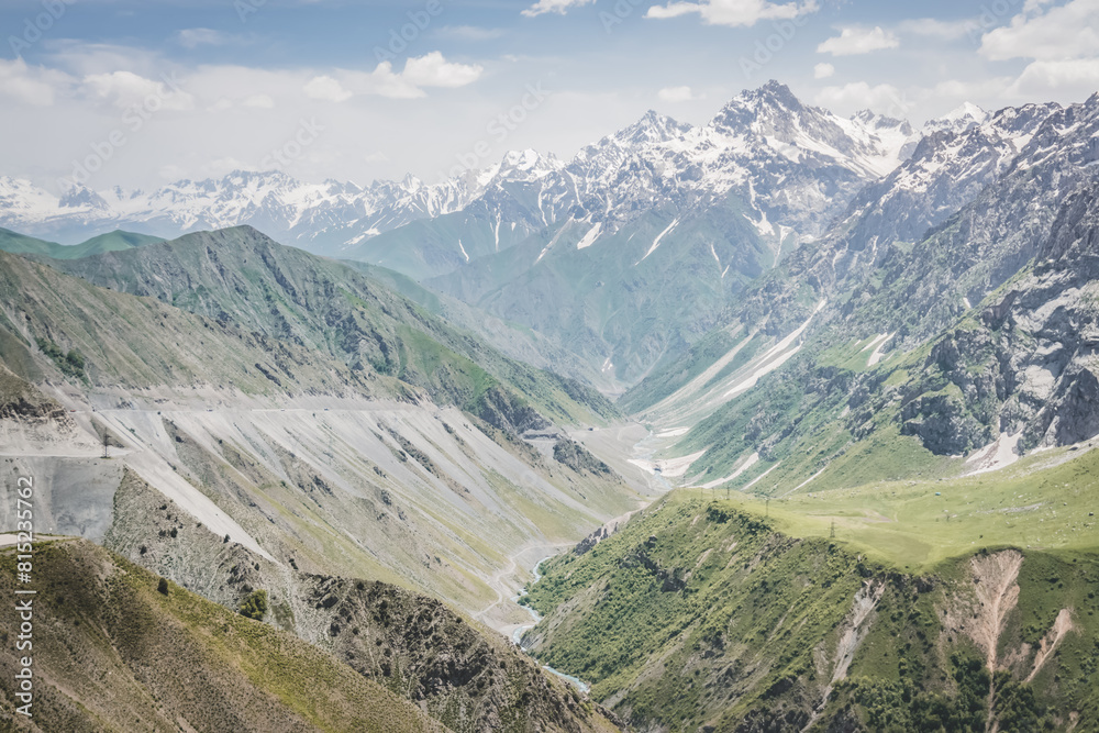 Naklejka premium Mountain panorama landscape in the mountains of Tajikistan on a sunny summer day, view of mountain ranges in the highlands