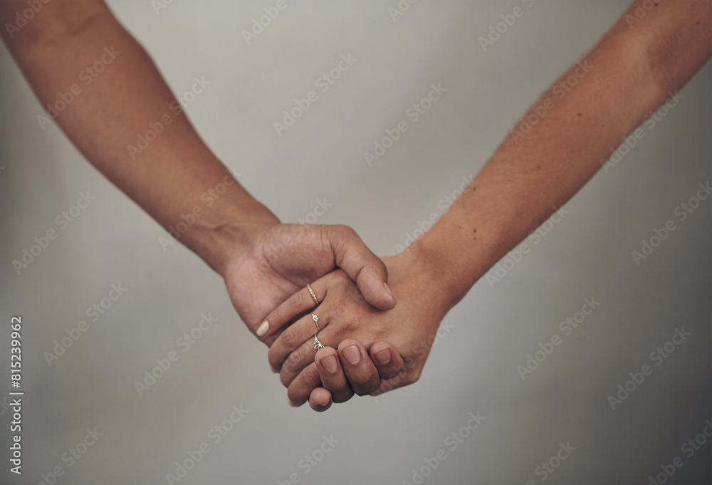Couple, love and holding hands for support, care and solidarity or romance with studio background. Compassion, partnership or relationship for people, marriage or hope or trust for affection together Couple, love and holding hands for support, care and solidarity or romance with studio background. Compassion, partnership or relationship for people, marriage or hope or trust for affection together