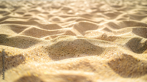 The image is of a sandy beach with a lot of sand. The sand is spread out in a way that it looks like a carpet. The beach is empty  and there are no people or objects visible in the image