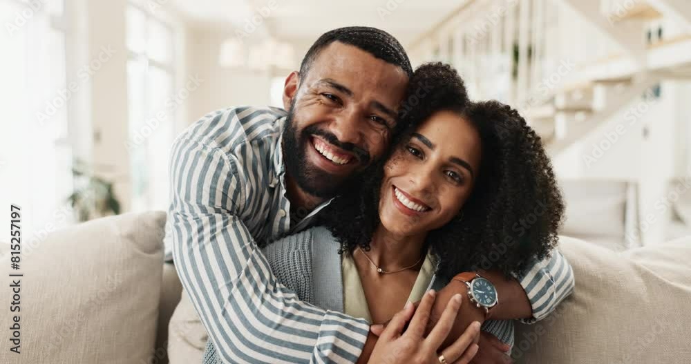 Face, relax and couple with hug on sofa for romantic bonding, commitment and support in marriage. Man, woman and love with embrace in living room for security, happiness and trust in loyalty at home Face, relax and couple with hug on sofa for romantic bonding, commitment and support in marriage. Man, woman and love with embrace in living room for security, happiness and trust in loyalty at home