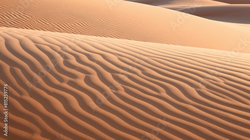 Close-up of flowing sand dunes creating wave-like patterns in the desert