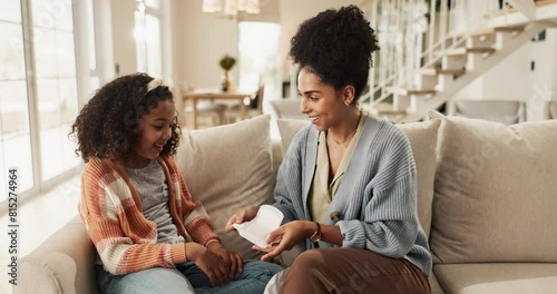 Mom, girl and home in sofa with sanitary pad for menstrual hygiene, education and awareness with information. Parent, kid and child development with support, care and teaching for life skills photo