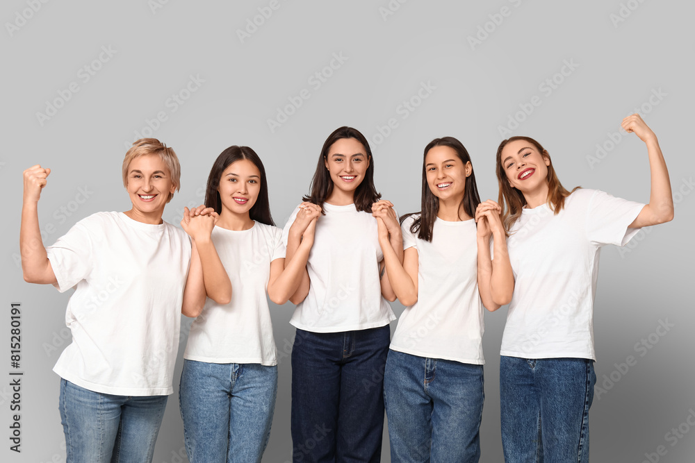 Obraz premium Many beautiful women on grey background. Women history month