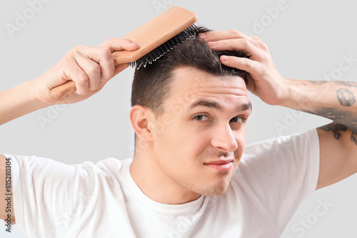 Young man with hair loss pr...