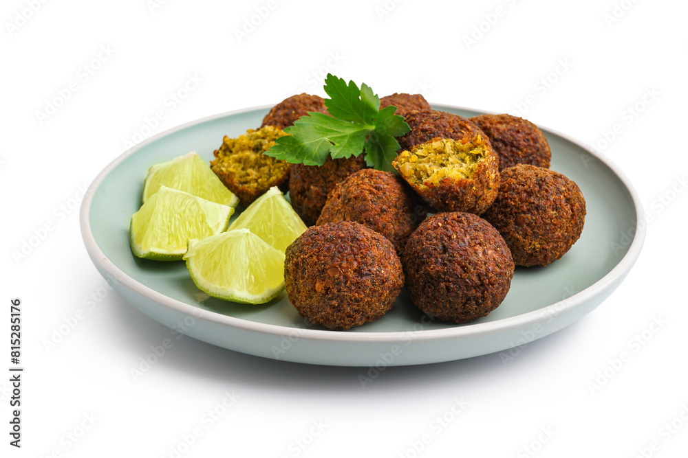 Plate with delicious falafel balls and lime on white background