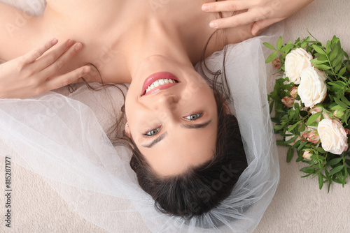 Beautiful young bride with ...