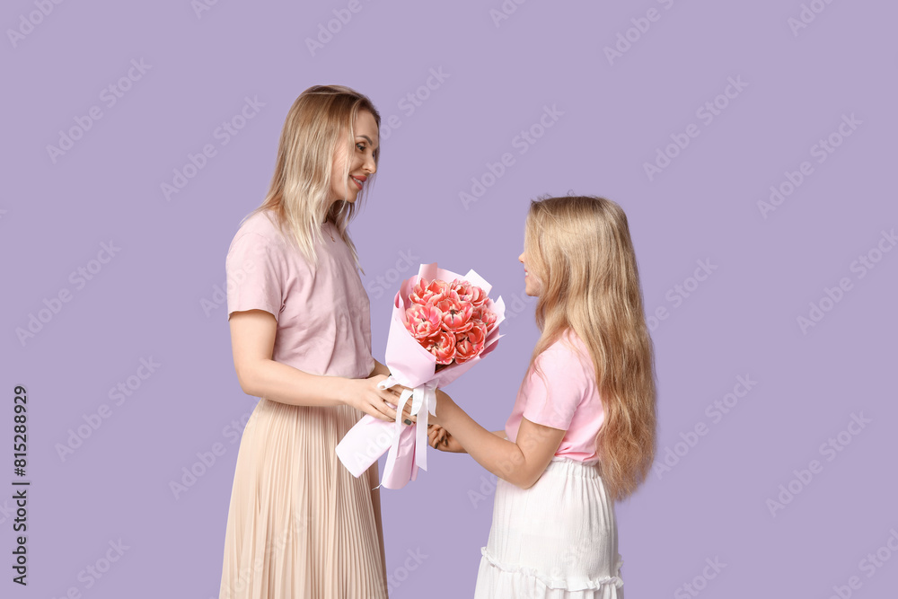 Cute little girl giving bouquet her mom for Mother's Day on lilac background Cute little girl giving bouquet her mom for Mother's Day on lilac background