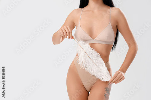 Beautiful young woman in be...