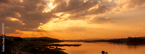 Banner Golden sky sunrise dramatic beautiful landscape view. Dawn sky gold dusk time cloudscape with sunlight. Panorama Dramatic sunset scenic landscape. Beautiful landscape nature with copy space