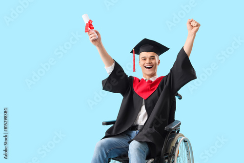 Happy male graduate in whee...