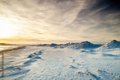 Ice dunes formed during winter in the lakeshore with Lake Michigan in background © Bao N Nguyen