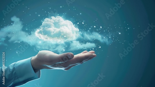 A businessman's hand holds a holographic cloud, representing cloud computing and tech