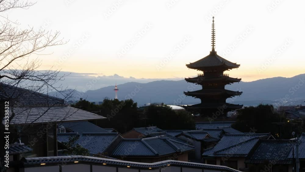 timelapse kyoto city aerial skyline view to ancient Yasaka pagoda building and Kyoto Tower at the back in higashiyama, Kyoto old town with sunset sky timelapse kyoto city aerial skyline view to ancient Yasaka pagoda building and Kyoto Tower at the back in higashiyama, Kyoto old town with sunset sky