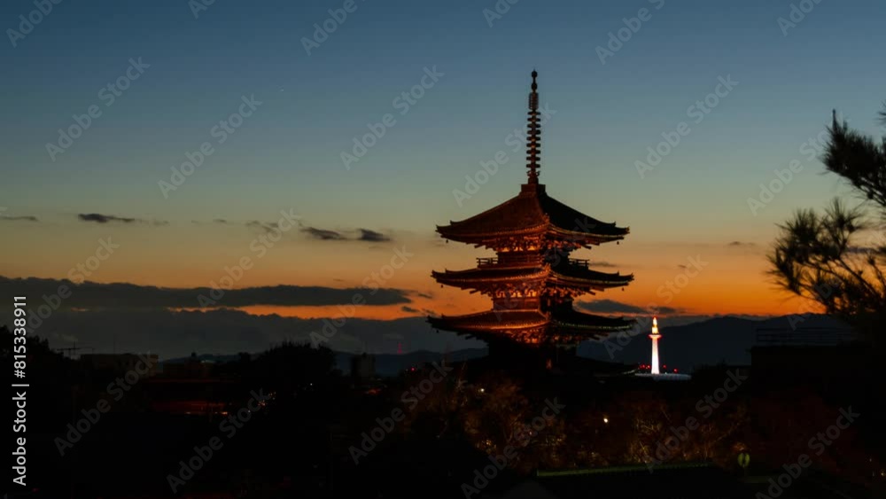 timelapse kyoto city aerial skyline view to ancient Yasaka pagoda building and Kyoto Tower at the back in higashiyama, Kyoto old town with sunset sky timelapse kyoto city aerial skyline view to ancient Yasaka pagoda building and Kyoto Tower at the back in higashiyama, Kyoto old town with sunset sky