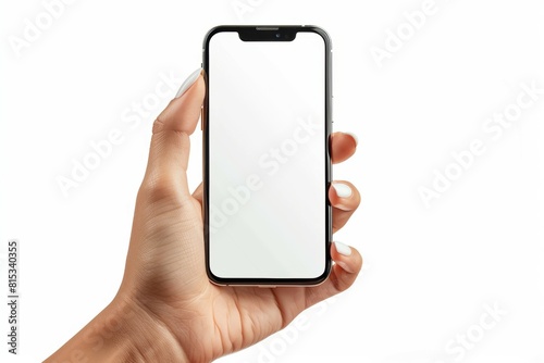 A hand holding a white cell phone