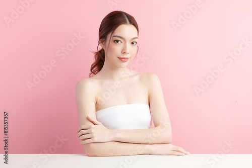 Beautiful young asian woman with clean fresh skin on pink background  Face care  Facial treatment  Cosmetology  beauty and spa  Asian women portrait.