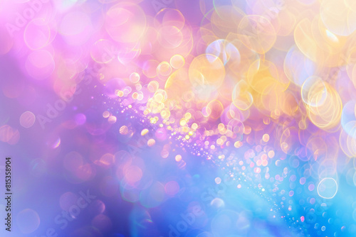 Abstract banner with blurred bokeh effect. They come in a rainbow of pastel purples, blues, golden yellows, silvery whites, and light pinks. The bokeh effect is blended smoothly