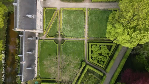 Beautiful monastery building complex and green yard in Belgium, aerial top down view photo