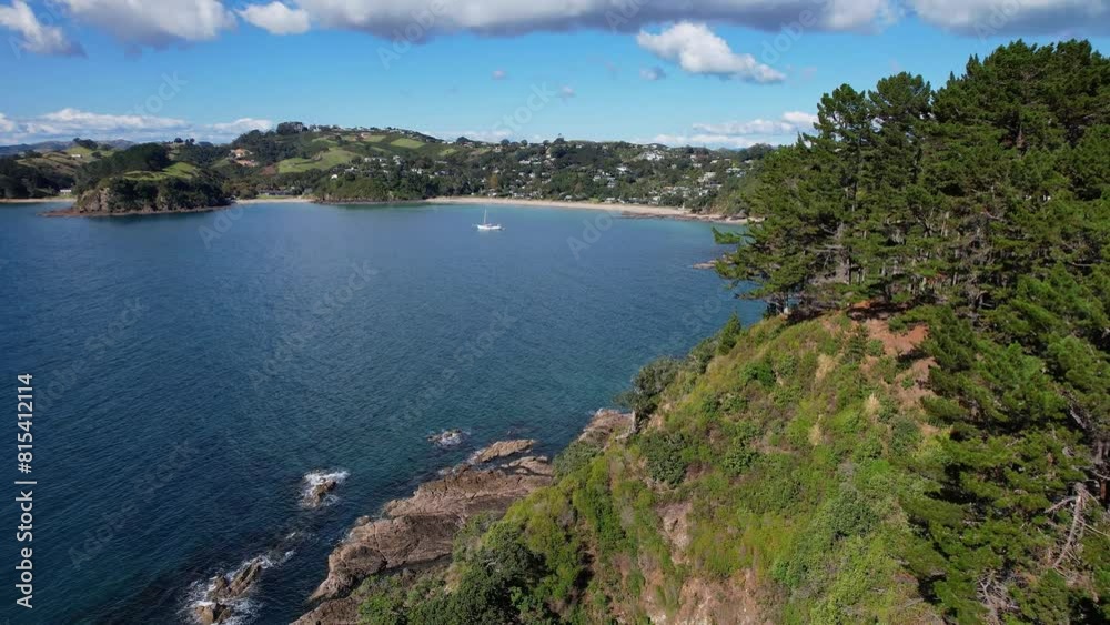 Distant View Of Palm Beach Coastal Settlement On Waiheke Island, New Zealand. aerial shot Distant View Of Palm Beach Coastal Settlement On Waiheke Island, New Zealand. aerial shot