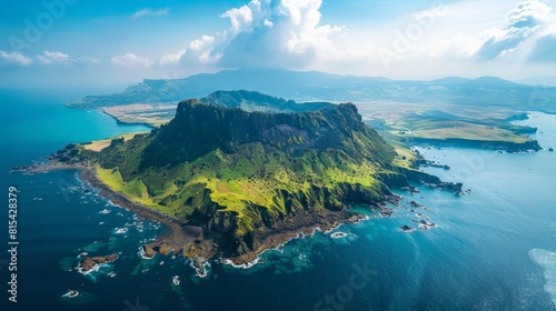 Aerial view of Jeju Island in South Korea, highlighting its volcanic landscape, beautiful coastlines, and famous Seongsan Ilchulbong peak.      photo