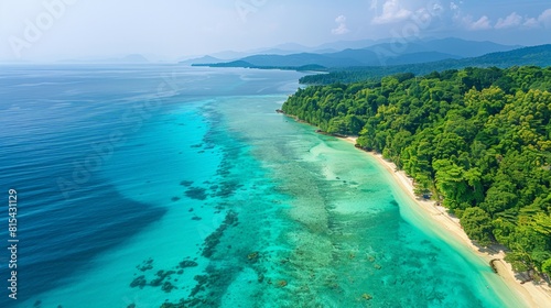 Aerial view of the Andaman Islands in India, showcasing the pristine beaches, turquoise waters, and lush tropical forests. 
