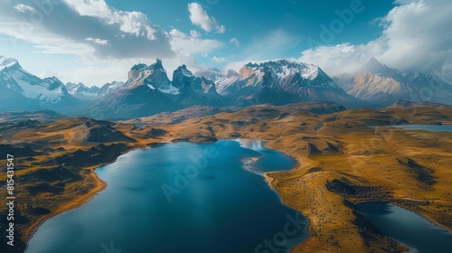 Aerial view of the Torres del Paine National Park in Chile  featuring the dramatic mountain peaks  glacial lakes  and vast Patagonian steppe.     
