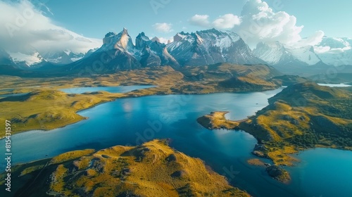 Aerial view of the Torres del Paine National Park in Chile, featuring the dramatic mountain peaks, glacial lakes, and vast Patagonian steppe.      photo