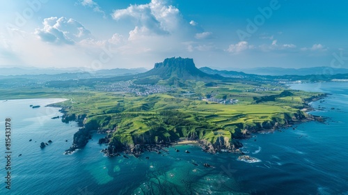 Aerial view of the Jeju Island in South Korea, highlighting its volcanic landscape, beautiful coastlines, and famous Seongsan Ilchulbong peak. 