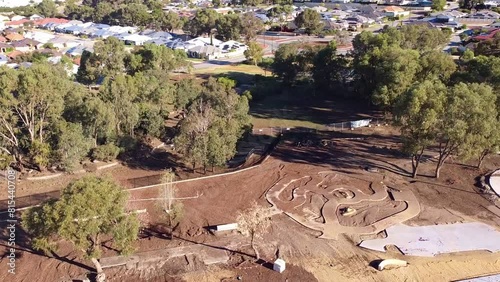 Wide aerial orbit around new all abilities playground construction, Riverlinks Park Clarkson photo