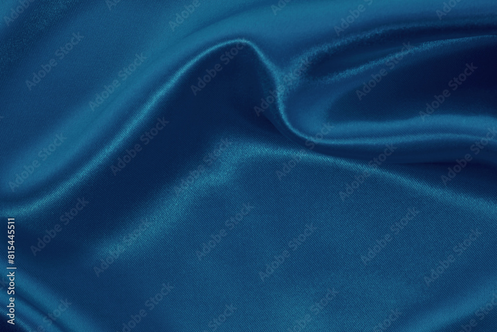 Fototapeta premium Dark blue fabric cloth texture for background and design art work, beautiful crumpled pattern of silk or linen.