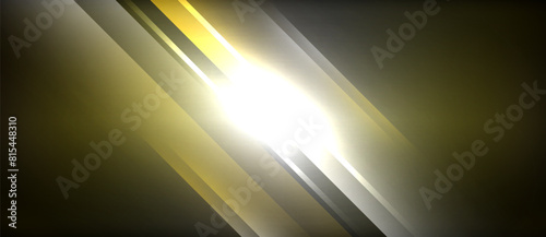 Amber tints and shades of light illuminate the darkness of a black background, creating a striking pattern on a composite material surface