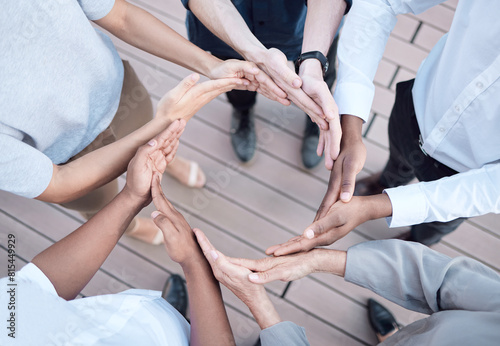 People, business and hands in circle for teamwork in day for solidarity, support and diversity in workplace. Team building, huddle and global collaboration for international company, trust and above