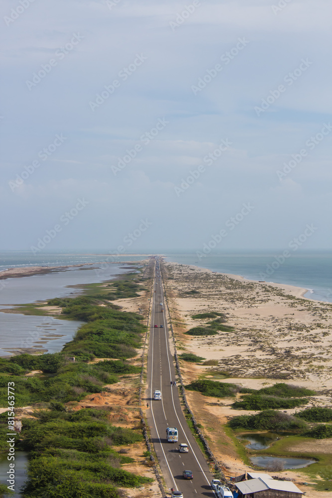 Top view of the road to Dhanushkodi, India. High angle view of the road to the sea, taken from above. Top view of the road to Dhanushkodi, India. High angle view of the road to the sea, taken from above.