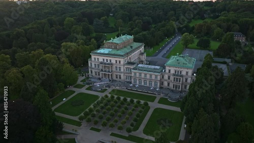 Aerial drone view of Villa Hügel in Essen, Germany. The Villa Hügel is a 19th-century mansion located in the Bredeney district, now part of Essen. A beautiful castle on the mountainside . photo