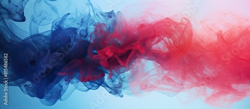 Isolated blue and red smoke cloud against a vape smoke background with copy space image