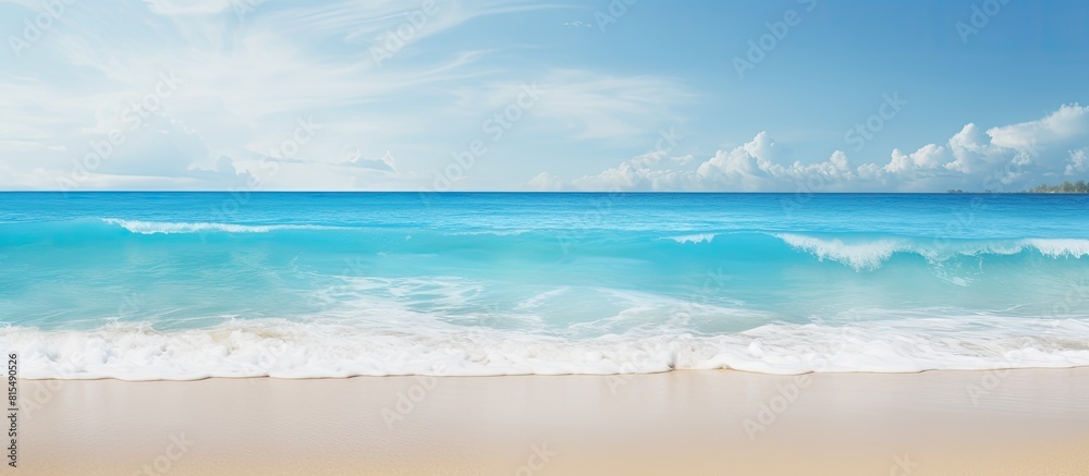 A serene tropical beach with soft sand and gentle ocean waves that create a soothing atmosphere Perfect for a copy space image