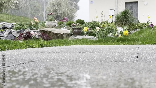 close up hailstorm in the garden during the day