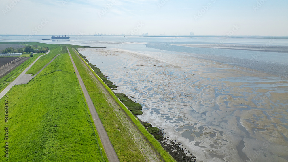 Aerial photo of dyke in the Dutch coast at low tide