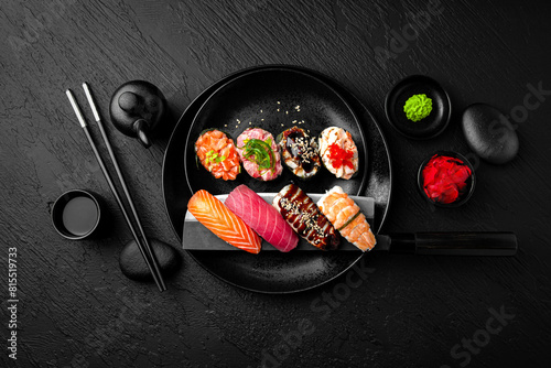 Nigiri composition on black background. The Art of Japanese Cuisine. Food photography for menu and sushi bar decoration