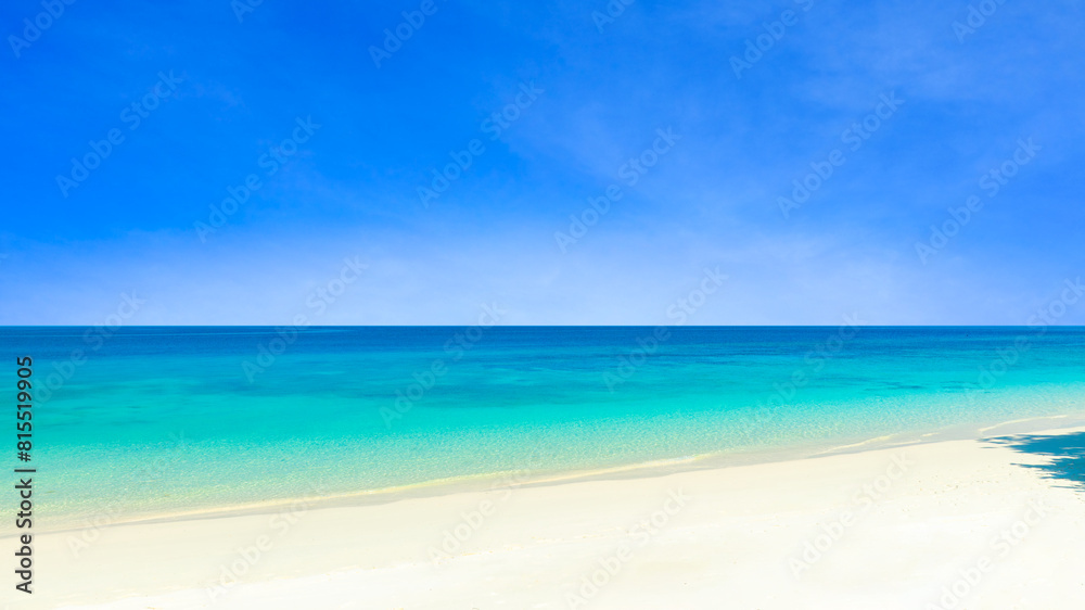 Nature of the beach and sea Summer with sunshine, sandy beaches, clear blue waters sparkling against the blue sky. On an island with good ecology and environment Background for summer vacation concept