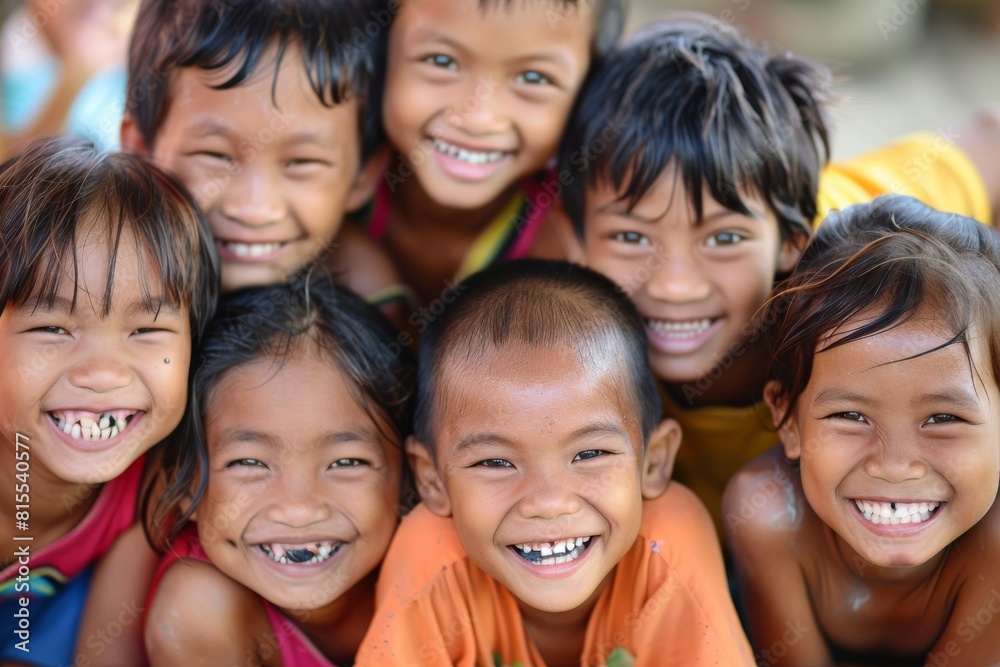 Group of happy asian children smiling and looking at the camera. Group of happy asian children smiling and looking at the camera.