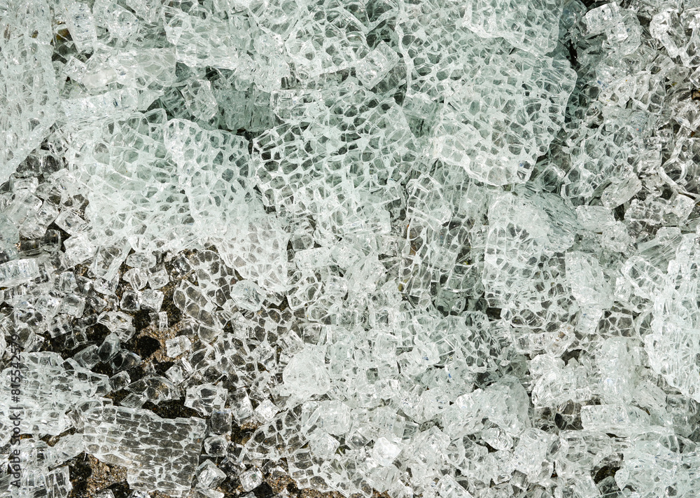 Background of broken tempered glass into small pieces.