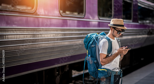 Traveler waits train at train station for travel in summer