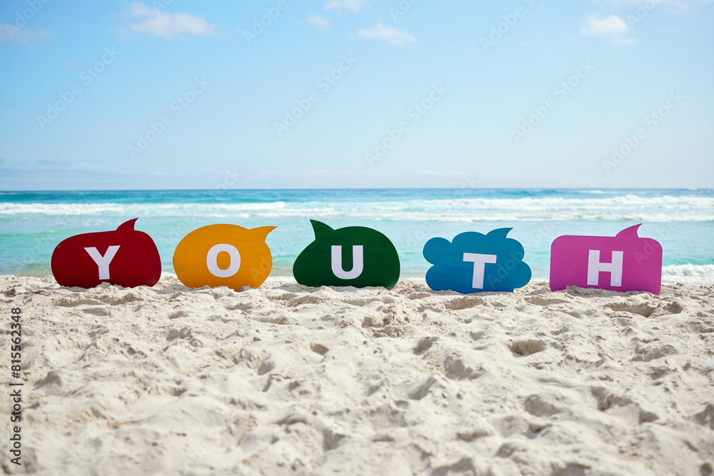 Obraz premium Social media, speech bubble and beach or youth in sand with sunshine, text and communication for words on seashore. Empty, summer and vacation, opportunity and conversation with colour or letters