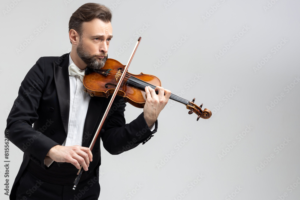 Man classic violinist at musical elegant performance Man classic violinist at musical elegant performance