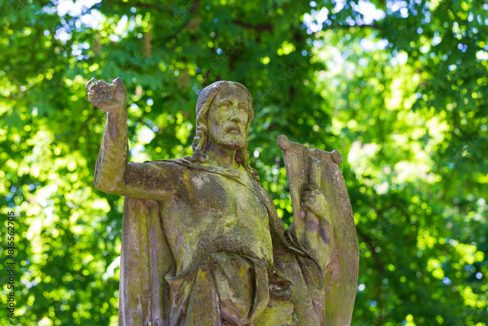 Historic Statue on the mystery old Prague Cemetery, Czech Republic