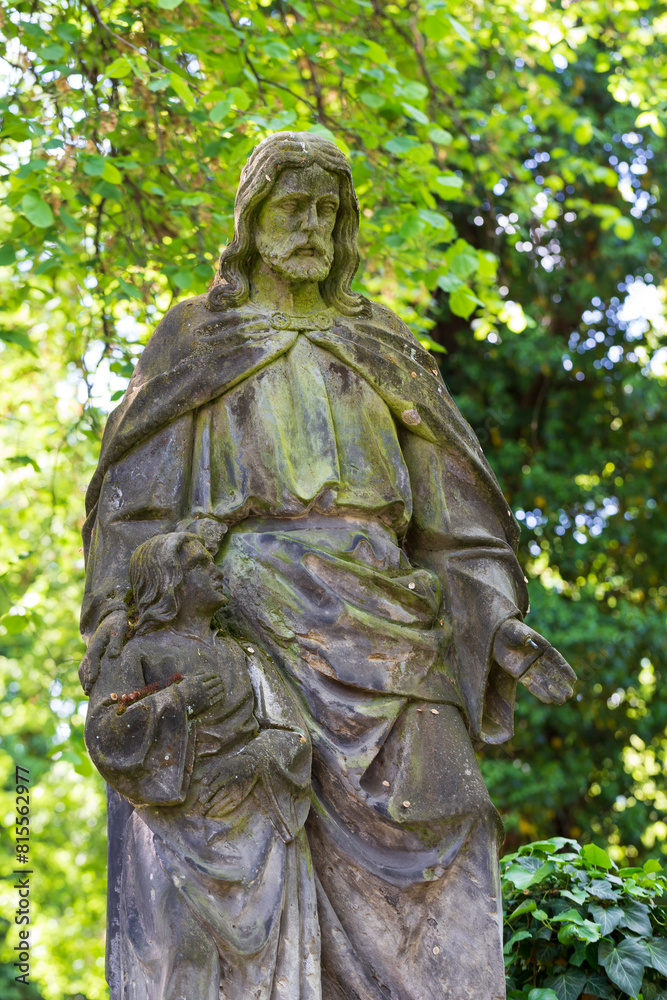 Historic Statue on the mystery old Prague Cemetery, Czech Republic