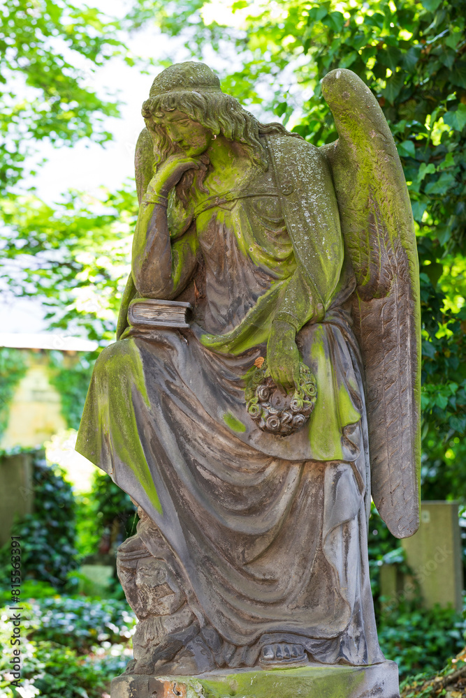 Historic Statue on the mystery old Prague Cemetery, Czech Republic